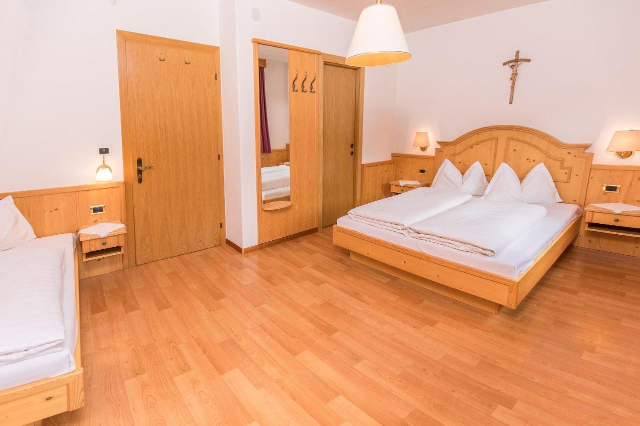 Dreibettzimmer mit Balkon